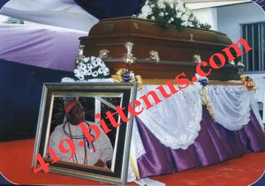 his picture during the burial ceremony